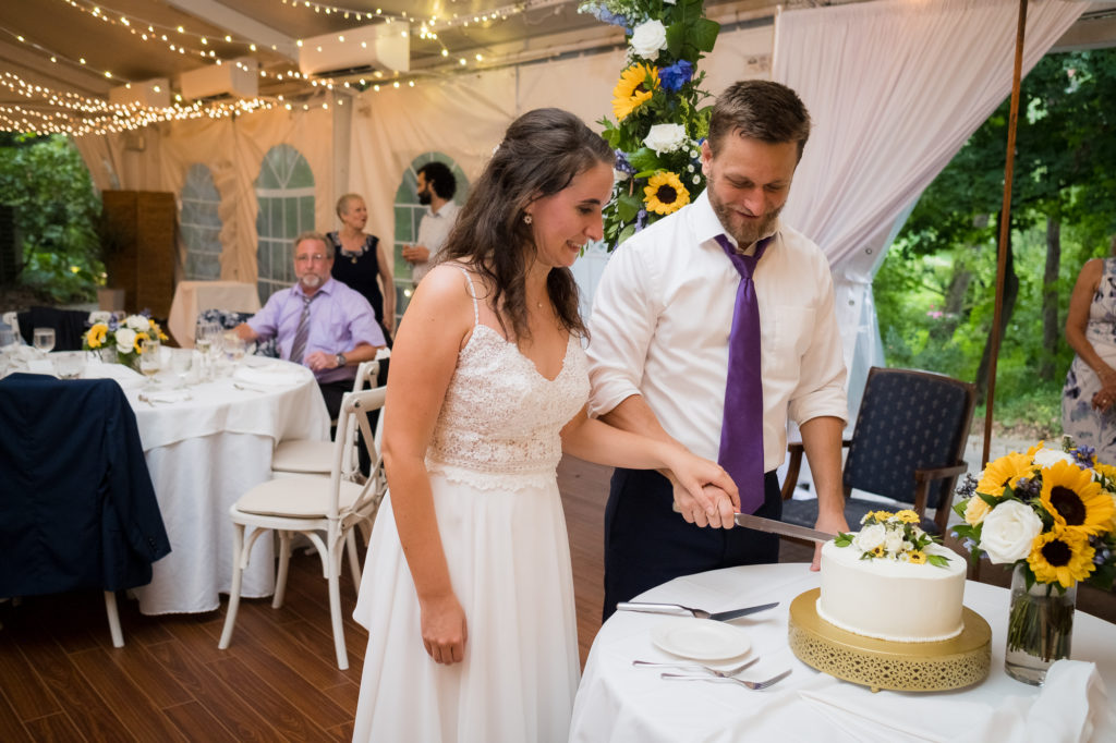Sunflower Themed Wedding | Elkridge Furnace Inn | cake cutting