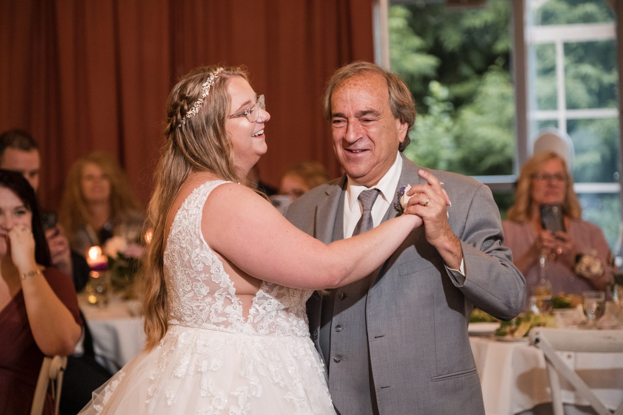 father dancing with his daughter at her wedding